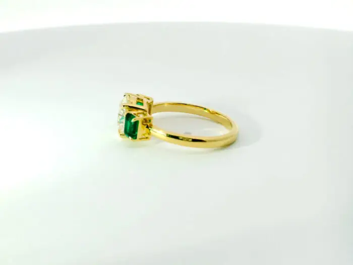 Huxley - Round Solitaire With Emerald Baguettes